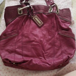 B. Makowsky magenta / purple leather purse